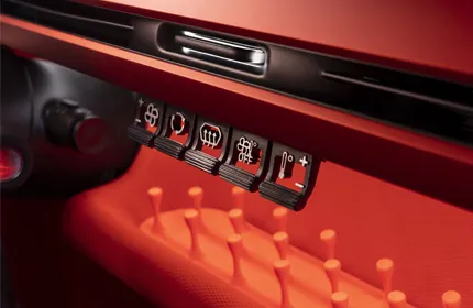 Citroën Oli vue détaillée de boutons orange vif